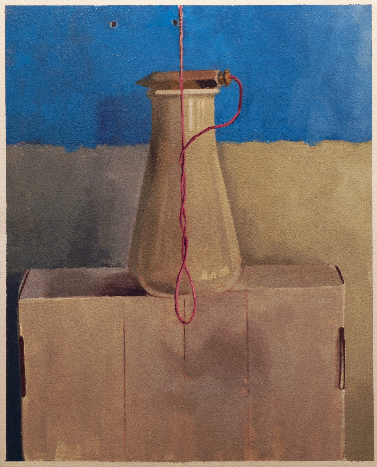 A plumb bob chilling atop an Erlenmeyer flask filled with plaster on a cardboard box